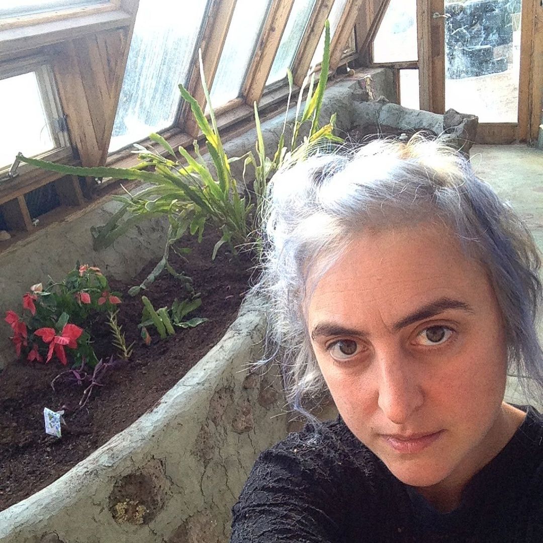 Amanda in greenhouse