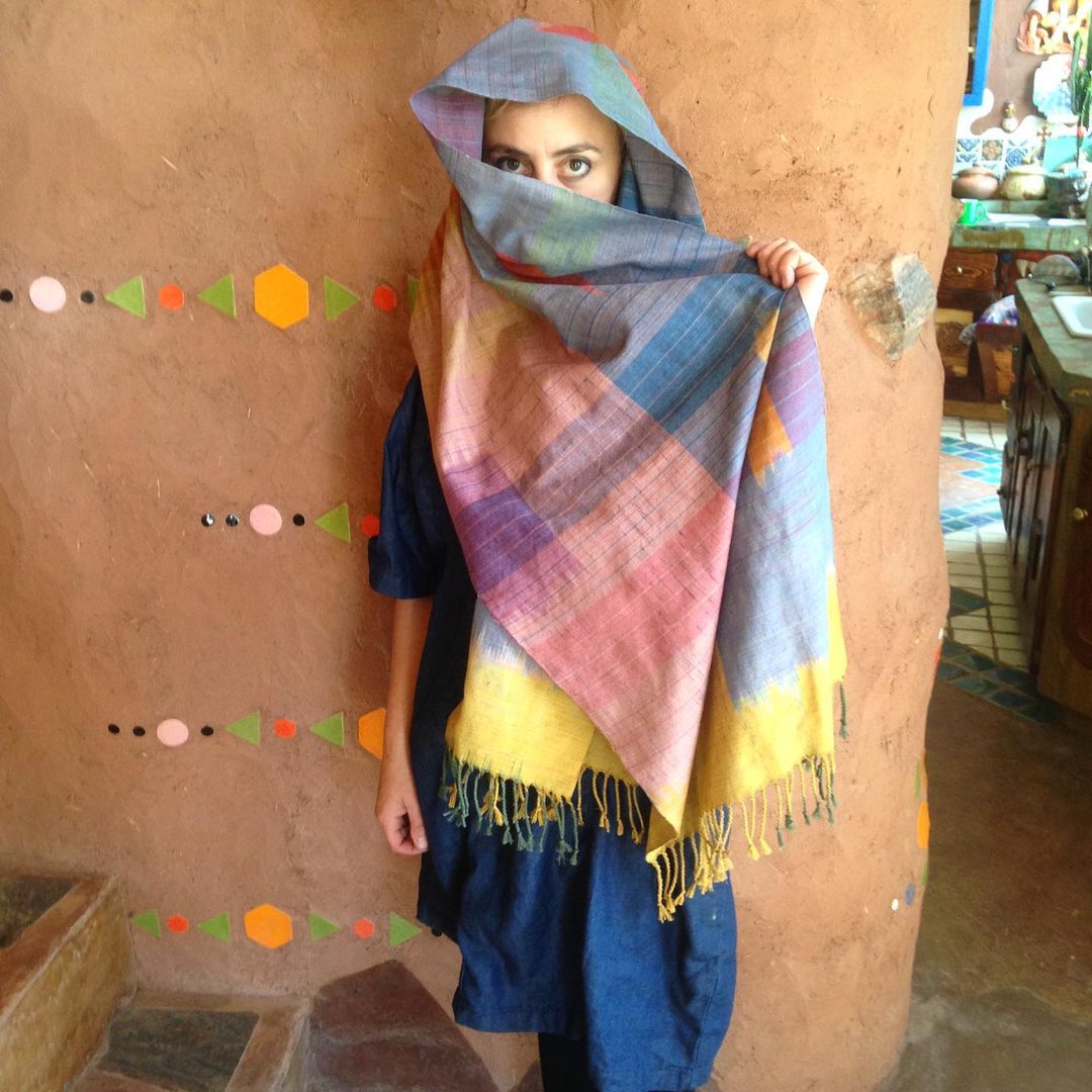 Amanda (behind her tiles embedded in the wall)